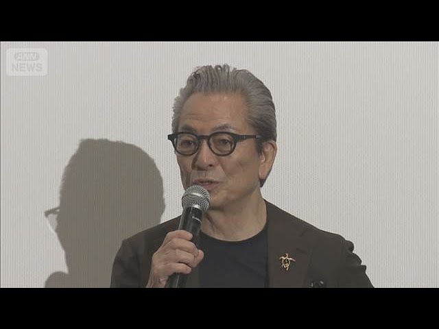 Yutaka Mizutani Receives 