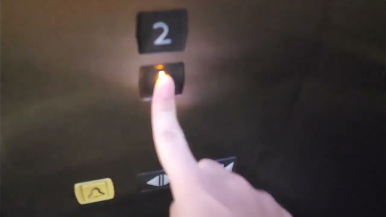 (Departures & Lounge Int'l) 2 Shanghai Mitsubishi Elevators at SH Pudong International Apt., SH, CN