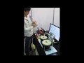 Robot beats drums in time with music and flute playing