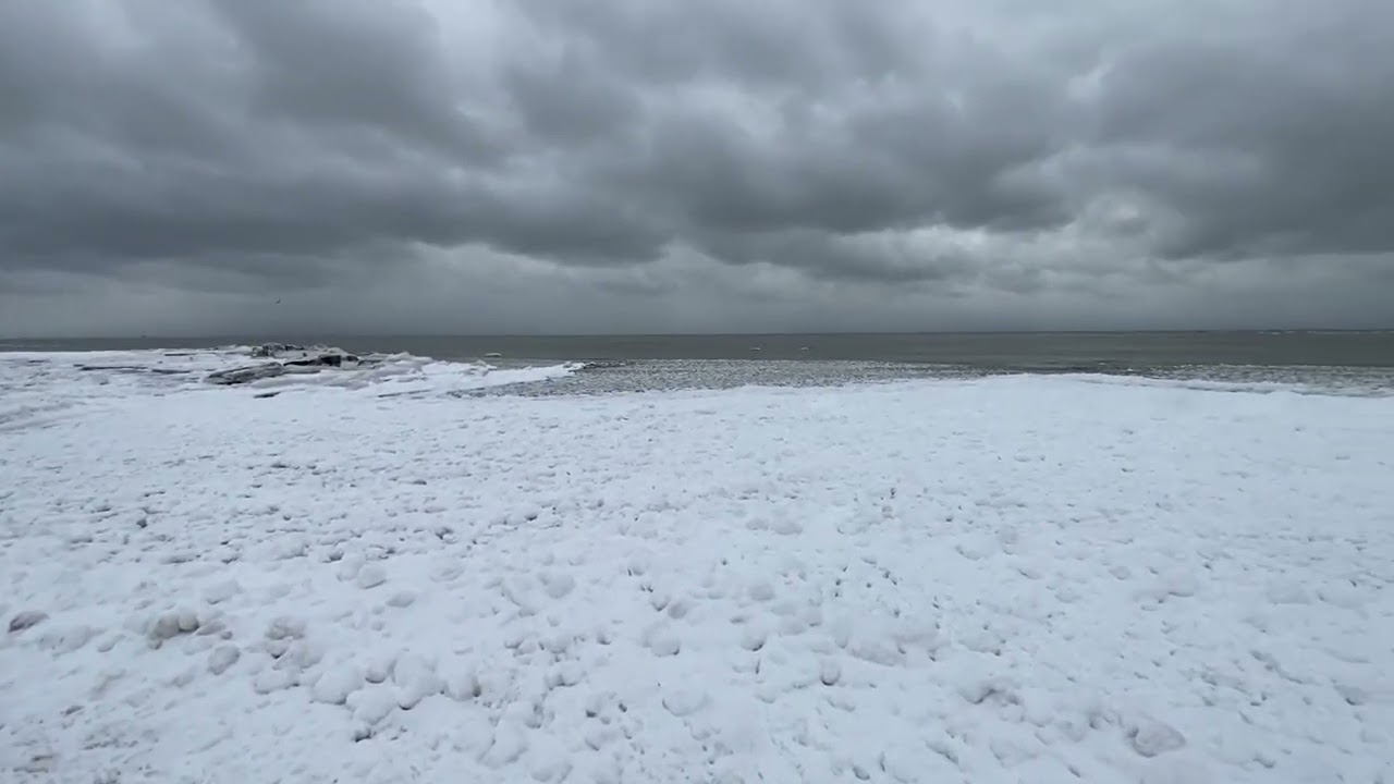 Snow and Ice Cover Lake Eerie After Winter Storm