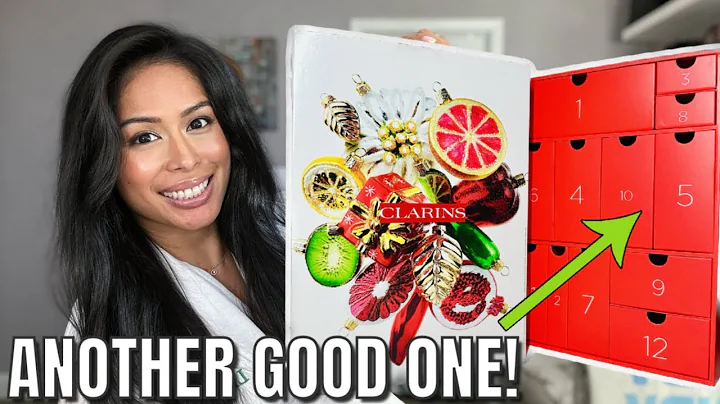 DONT SLEEP ON THIS SKINCARE! UNBOXING THE CLARINS ADVENT CALENDAR  VLOGMESS DAY 14