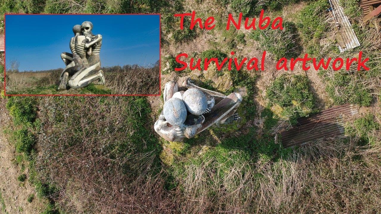 The Nuba Survival artwork at an edge of a farmers field