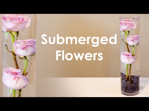 Video: Blomsterbordsdekoration: Hur man gör flytande blomsterarrangemang