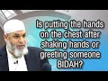 Is putting the hands on the chest after shaking hands or greeting someone BIDAH?