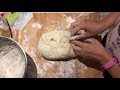 KNEADING THE BREAD DOUGH