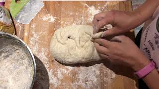 KNEADING THE BREAD DOUGH