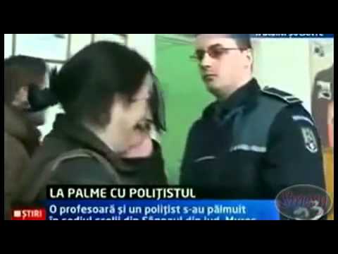 Woman slaps a police officer and gets happy slapped back then starts crying