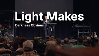 Light makes darkness obvious