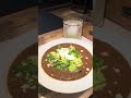 Black bean soup with avocado, greek yogurt, cilantro and a ranch water margarita mocktail
