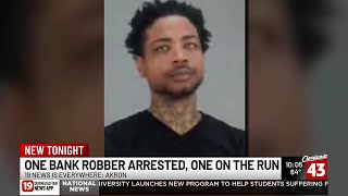 Arrest made in Akron bank robbery; reward offered for 2nd suspect