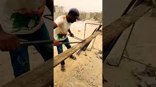 Bend Rebar manually by hand✋ skilled steel fixer for making reinforcement stirrups (rings) of Column Bend Rebar manually by hand✋ skilled steel fixer for making reinforcement stirrups (rings) of Column