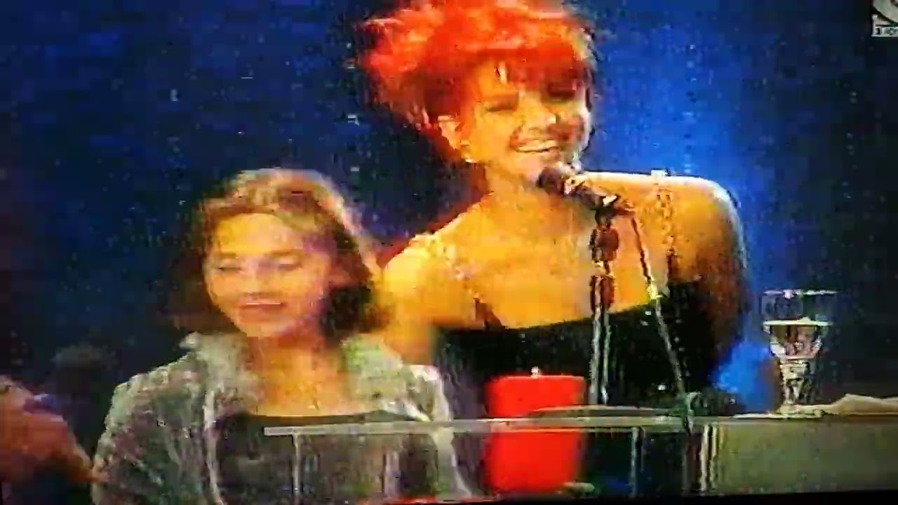 Award ceremony for Romanian Team gold medalist at 1999 Worlds & Lavinia Milosovici ( as announcer)