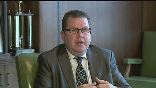 Attorneys, store owner charged with planning extortion