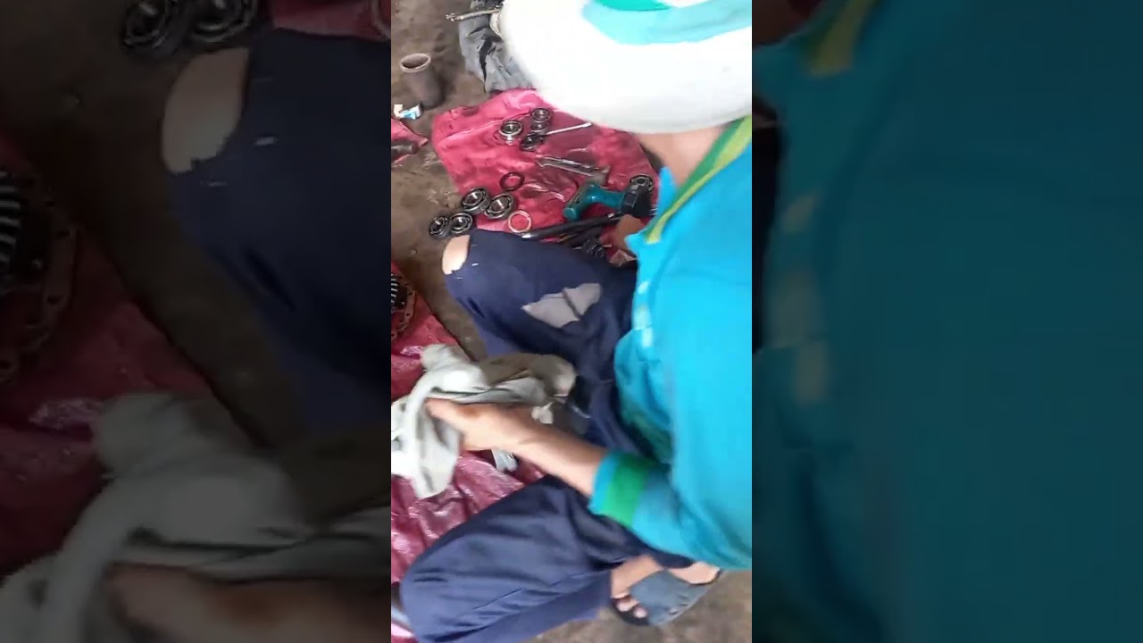 thay phót trục đứng bạc thao phót bánh cầu trước máy cày iseki 3110