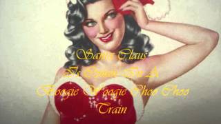 Video thumbnail of "Santa Claus Is Comin' In A Boogie Woogie Choo Choo Train ~ The Tractors"