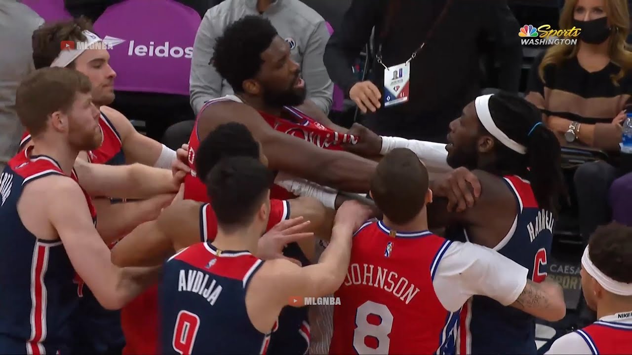Joel Embiid did not like that foul by Harrell and the two just got in a minor scuffle