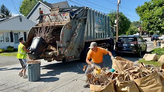 EZ Disposal Garbage Truck Packing Heavy Yard Waste Piles