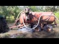 Битва за урожай 2016, испытание бочки  МЖТ-6 трактром John Deere 8200 на реке красная (раминте)