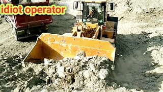 Cat 966F Wheel Loader Loading Limestone On Trucks