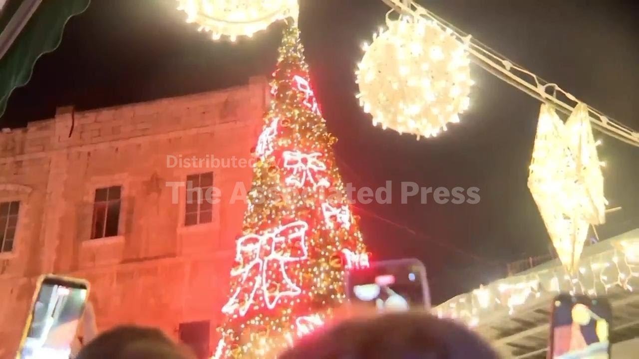 Christmas tree lit up in Jerusalem’s Old City Christian quarter for first time since Gaza war