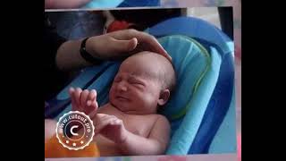 AKNW. Daddy giving her the first bath.