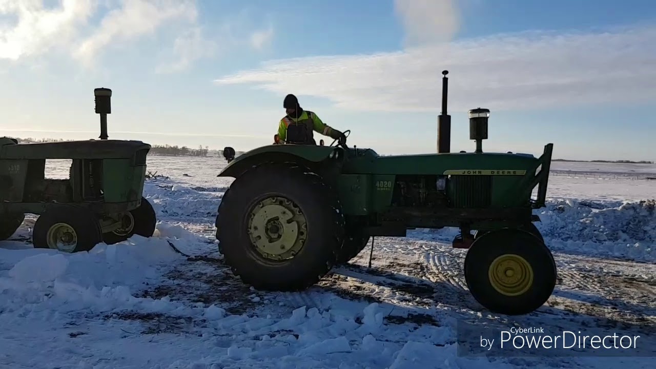 The 4020 drives out the 5010 gets pushed in! John deere project tractor
