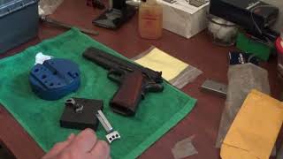 Adjustment of overtravel on 1911 pistol triggers.