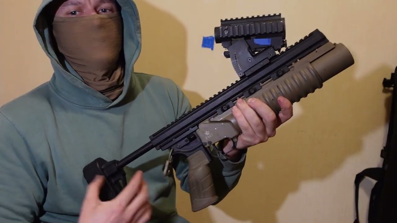 LMT M203 grenade launcher - YouTube