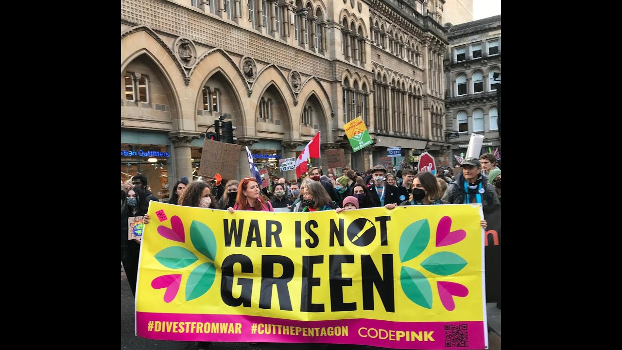 "The Largest Industrial Polluter on the Planet." Interview with CODEPINK's Jodie Evans