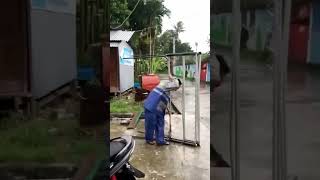 Strong Man Carrying a Giant Steel Structure