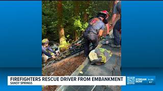 Car goes down embankment in Sandy Springs