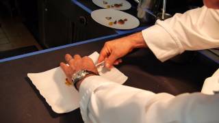 Citrin prepares a signature dish at service at Mélisse