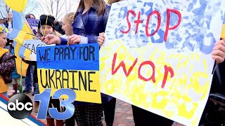 Hundreds gather in support, solidarity, prayer for Ukraine in downtown Asheville