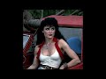 Cadillacs and Dinossaurs as an 80's Dark Fantasy Film