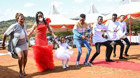 Kasolo and His family on Stage ni kinene whah. *811*104# During Purity and Alex Ngasya. subscribe