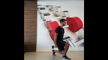 Avanço e Retrocesso Unilateral com Halteres