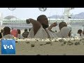 Hajj pilgrims participate in stoning of devil tradition in saudi arabia
