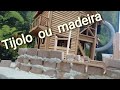 Construção da casa em miniatura de tijolos