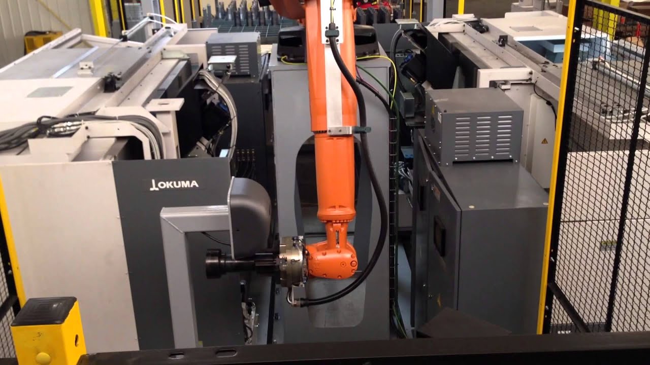 Machine Tending - Robot Tending (2) Okuma Machine Tools - YouTube