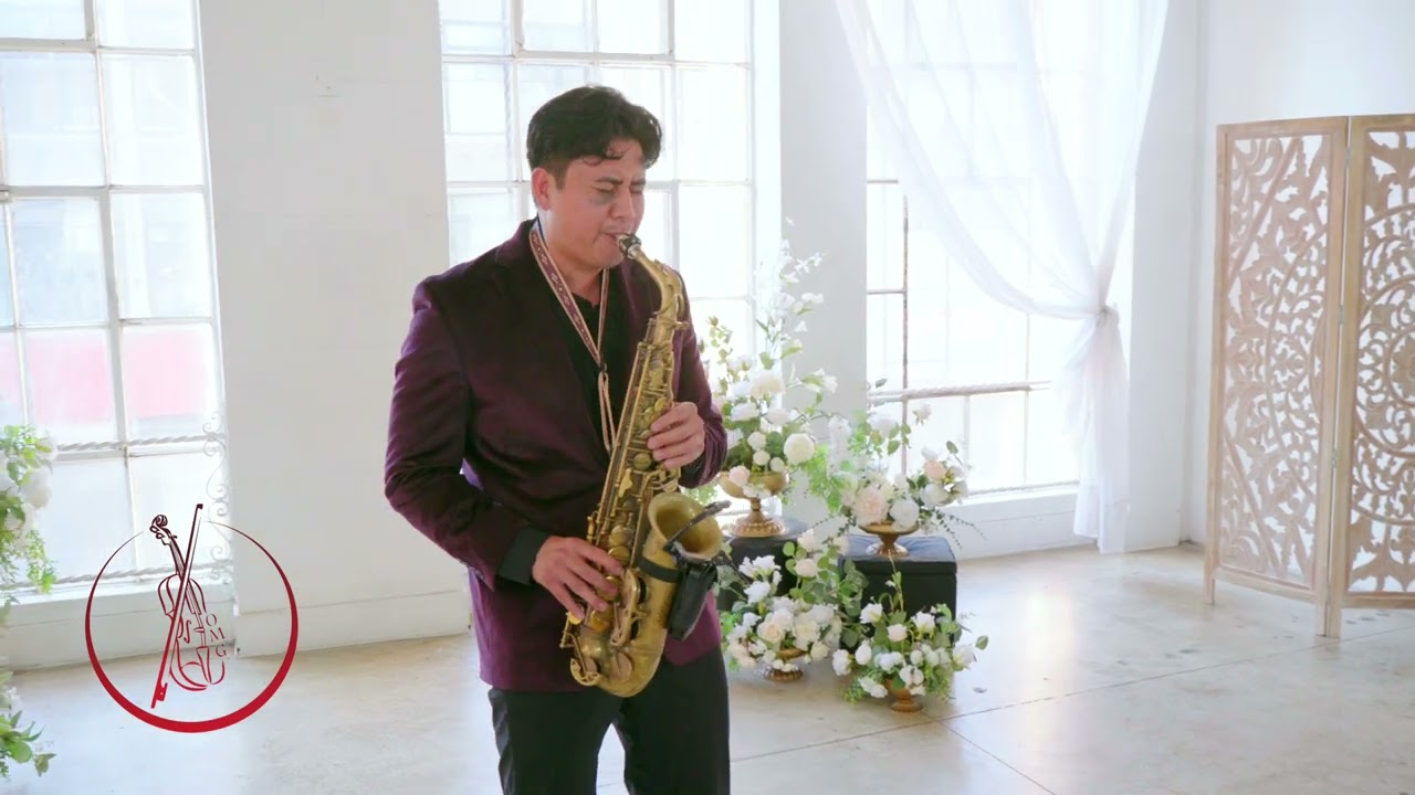 Austin saxophonist performing Tennessee Whiskey on saxophone