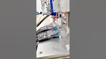 Hooks and Labels Automatic Feeding and Tagging System.