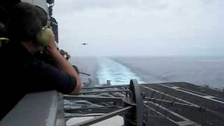 F18 Hornet landing on the USS Nimitz