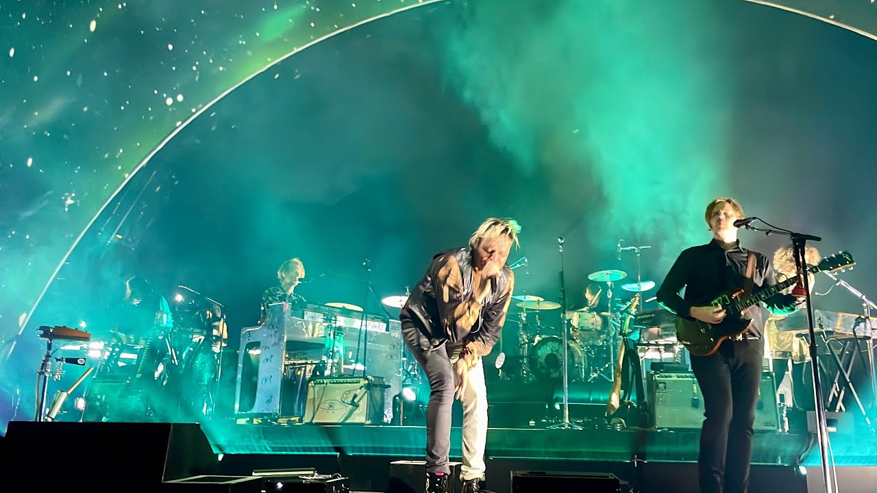 Arcade Fire performs a live music video for 'Afterlife' - The Strut