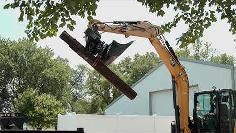 Cat® TRS6 Tiltrotator with Grapple at Work