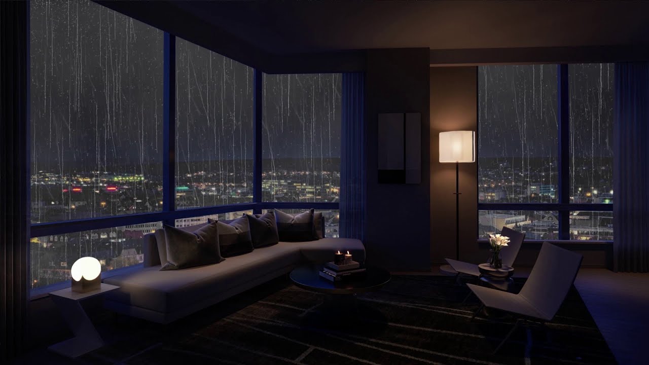Heavy rain on the windows of an apartment overlooking the night city in