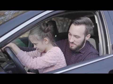 Portrait Little Girl Sitting on Father's Lap in the Car Close  | Videohive Project Templates