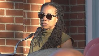 Ayesha Bell speaks at vigil for her son Najee Hardaway, a Shaker Heights teacher who died at age 26