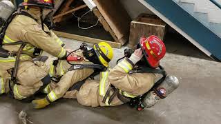 Doffing PPE of an unconscious firefighter