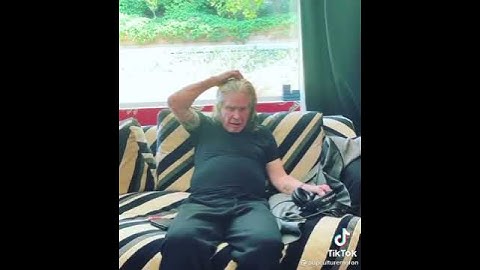 Ozzy Osbourne listens to Little John