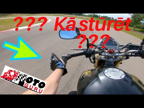 Video: Kā jūs centrējat motocikla stūri?